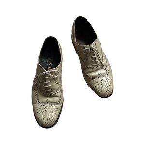 Cream designer leather brogues